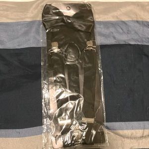 Black suspenders and bow tie